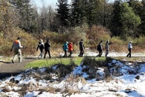 Photograph of hikers on the new Universal Access Trail in Bloomfield's LaSalette Open Space