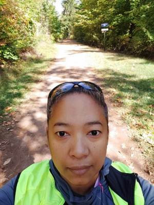 Photograph of Brenda Watson on a hiking trail